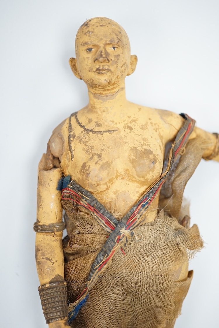 Two Indian clay figures, 26cm high